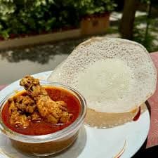 Appam with Chicken Curry